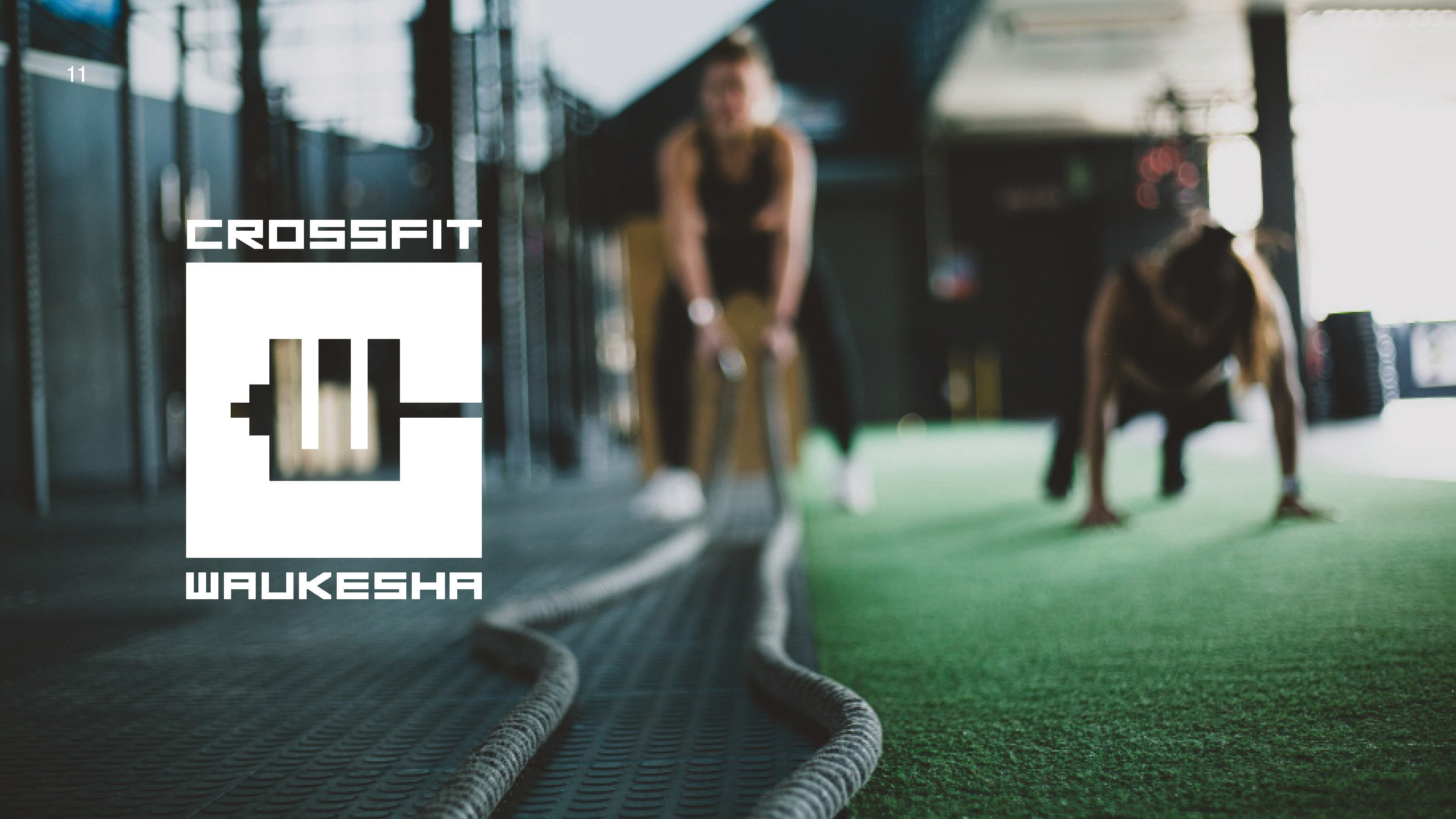 CrossFit gym athletes training with weights